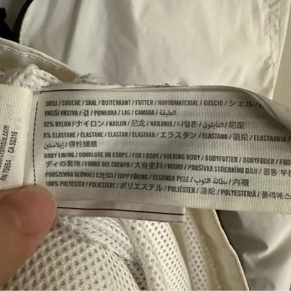Hollister White windbreaker zip up. Small‎